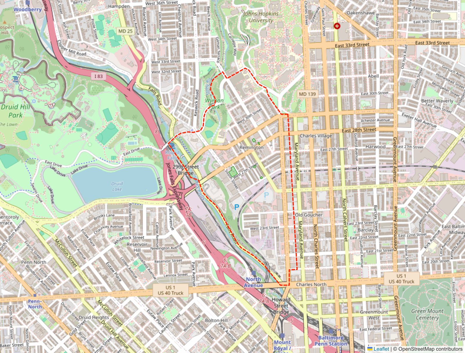 Map of Baltimore with the Remington neighborhood outlined in red between Druid Hill Park, Johns Hopkins University and Charles Village, its green spaces filled in